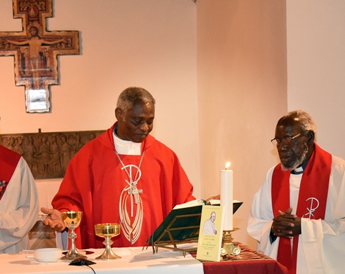Cardinal Turkson and Archbishop Paride (right) celebrate Eucharist.