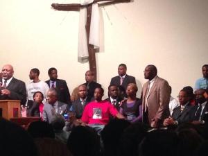 Family of Michael Brown gather at Greater St. Mark's Family Church in Ferguson, MO.